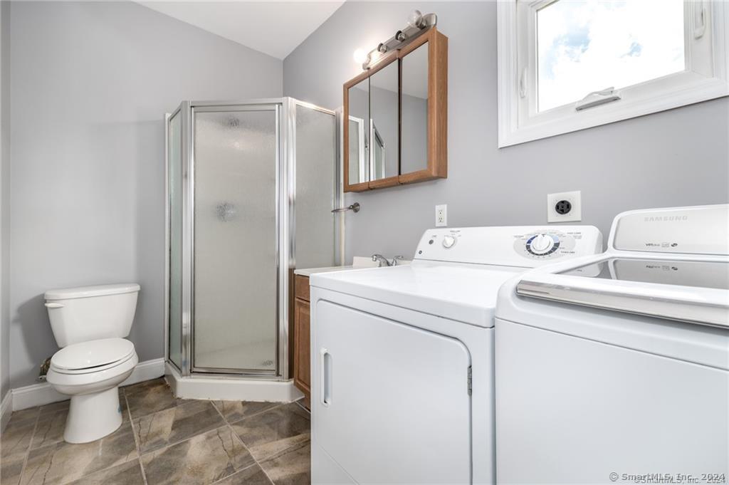 29 Dolsen Place, Unit 2 Stamford, CT 06901 - Photo 7 of 18 a bathroom with a sink toilet and shower