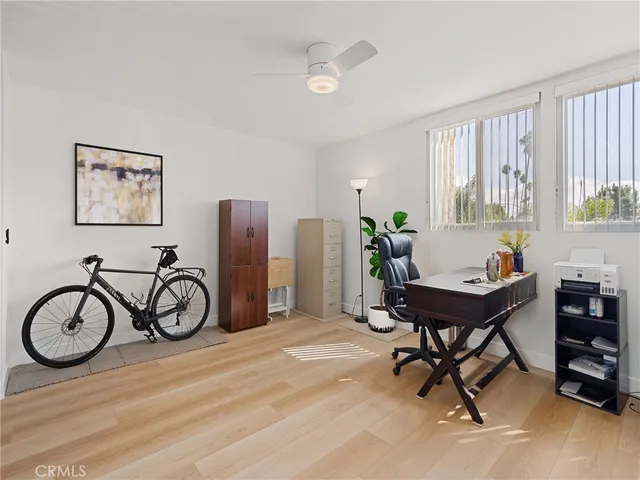 a bathroom with a shower sink vanity mirror and toilet
