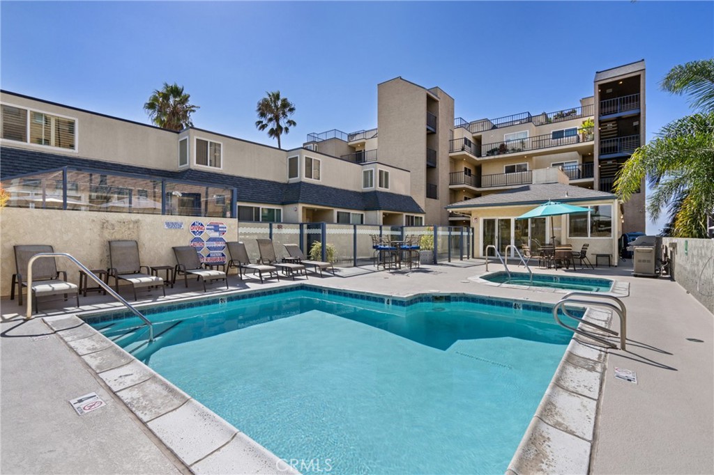 1 3rd Place, Unit 2 Long Beach, CA 90802 - Photo 20 of 40 a front view of a building with swimming pool