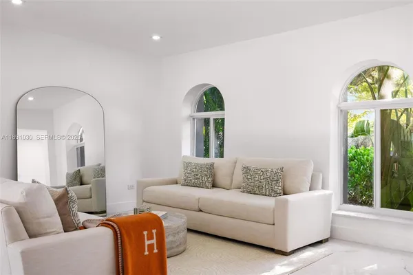 a bathroom with a bathtub and a sink