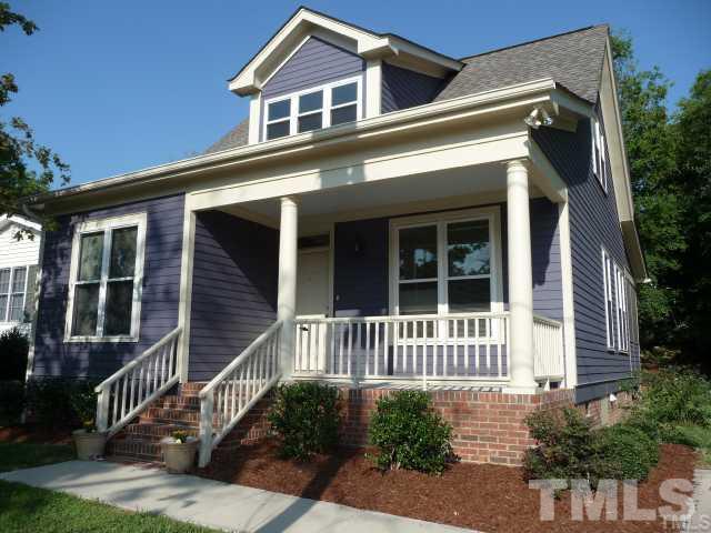 a front view of a house with a porch