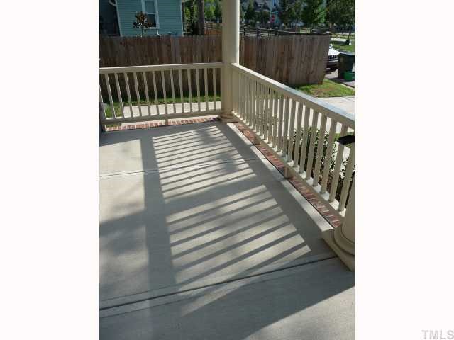 310 Cooke Street Raleigh, NC 27601 - Photo 2 of 12 a view of a balcony with wooden floor