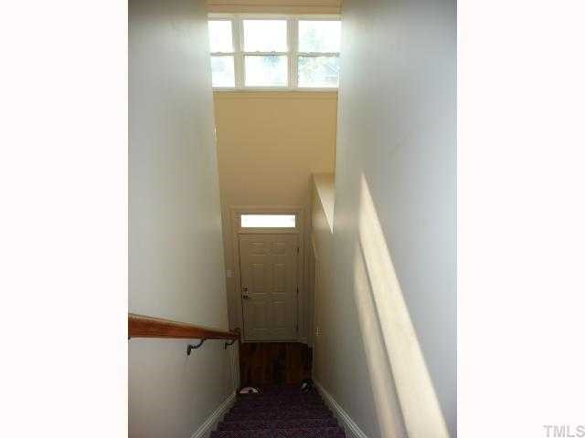 310 Cooke Street Raleigh, NC 27601 - Photo 4 of 12 a view of hallway with stairs