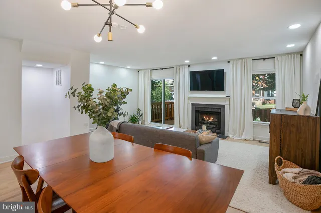 a view of a livingroom with furniture and a fireplace