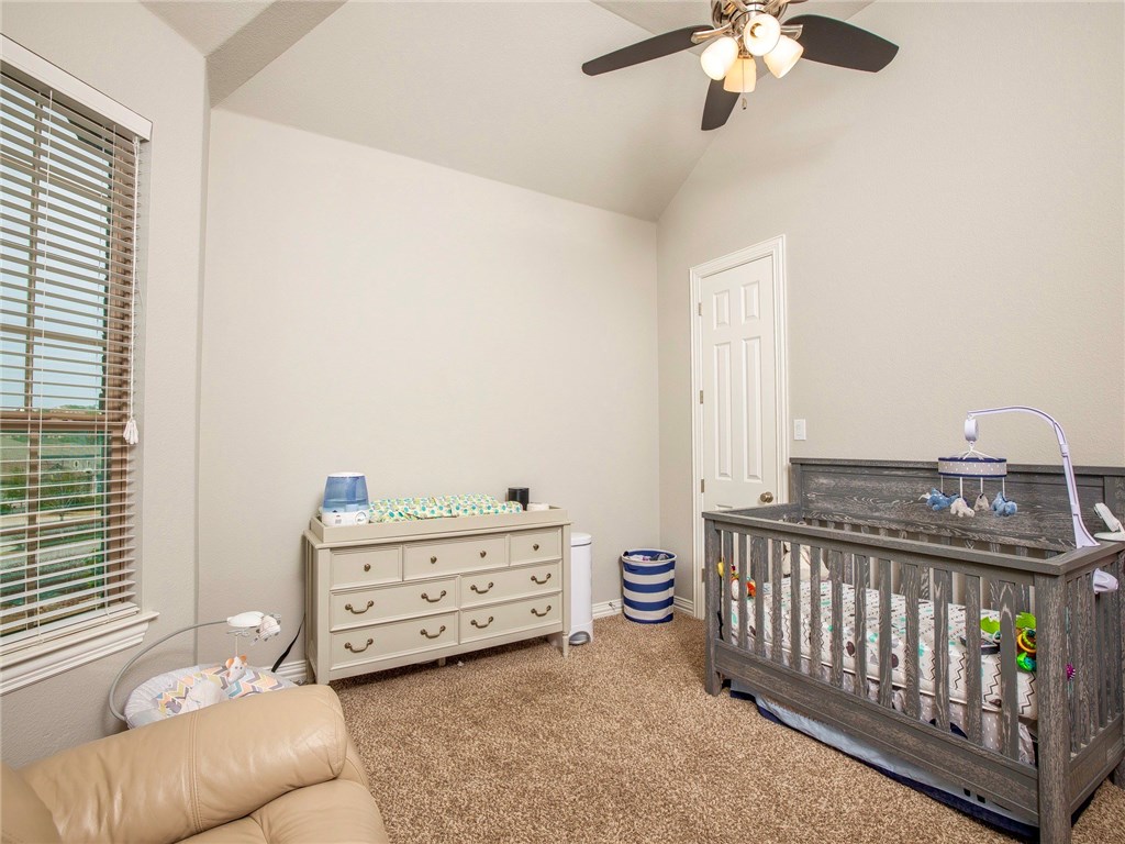 3401 Venezia View Leander, TX 78641 - Photo 30 of 40 Secondary Bedroom on the Main Floor