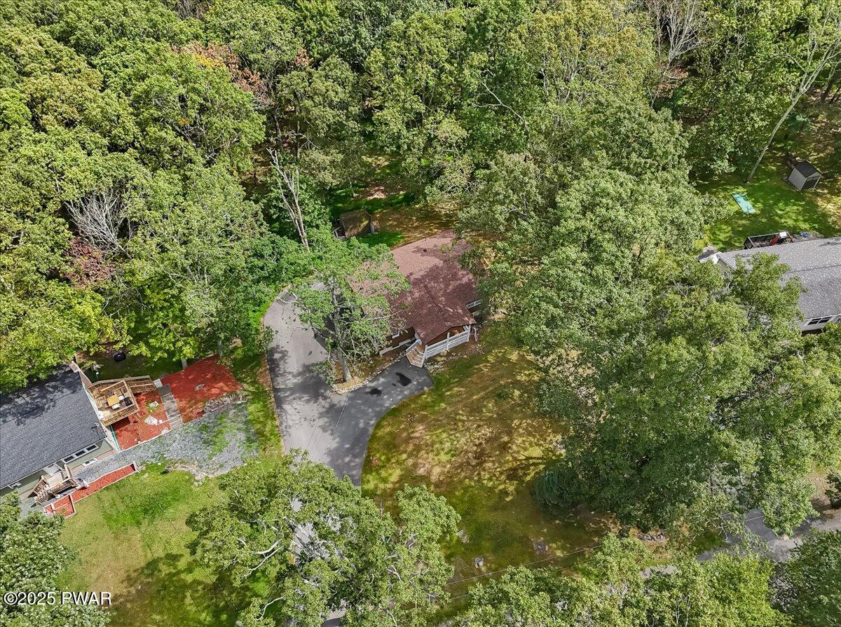 107 Kiel Road Milford, PA 18337 - Photo 66 of 71 an aerial view of residential house with outdoor space and trees all around