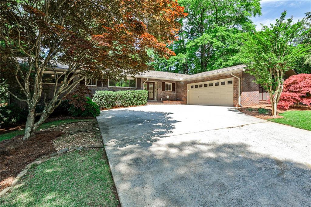 1280 Berkeley Road Avondale Estates, GA 30002 - Photo 1 of 1 a view of a house with a yard
