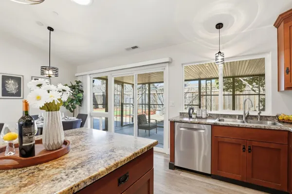 a kitchen with sink and window