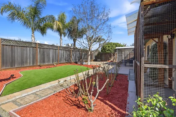 a view of a room with wooden walls