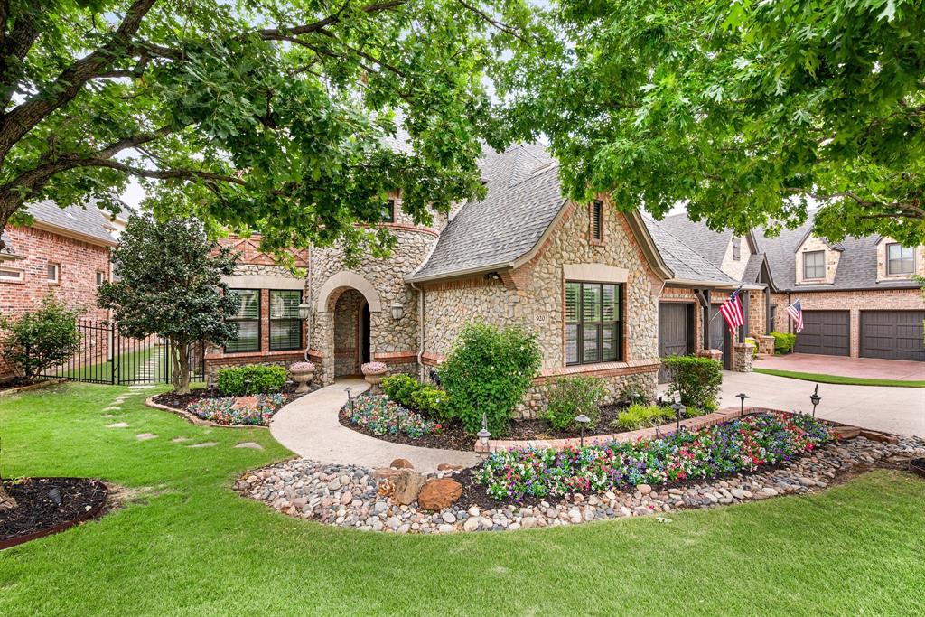 920 Glenhurst Road Keller, TX 76248 - Photo 1 of 1 a front view of a house with a garden