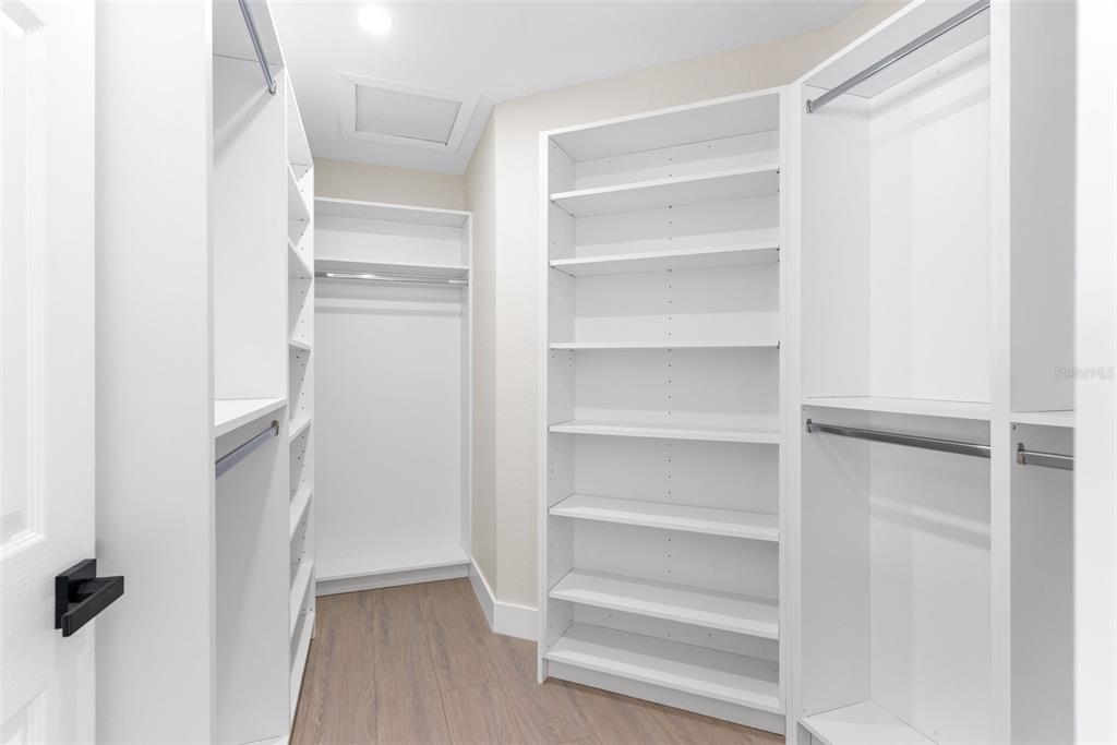 12368 70th Street Largo, FL 33773 - Photo 18 of 33 a view of walk in closet with empty racks