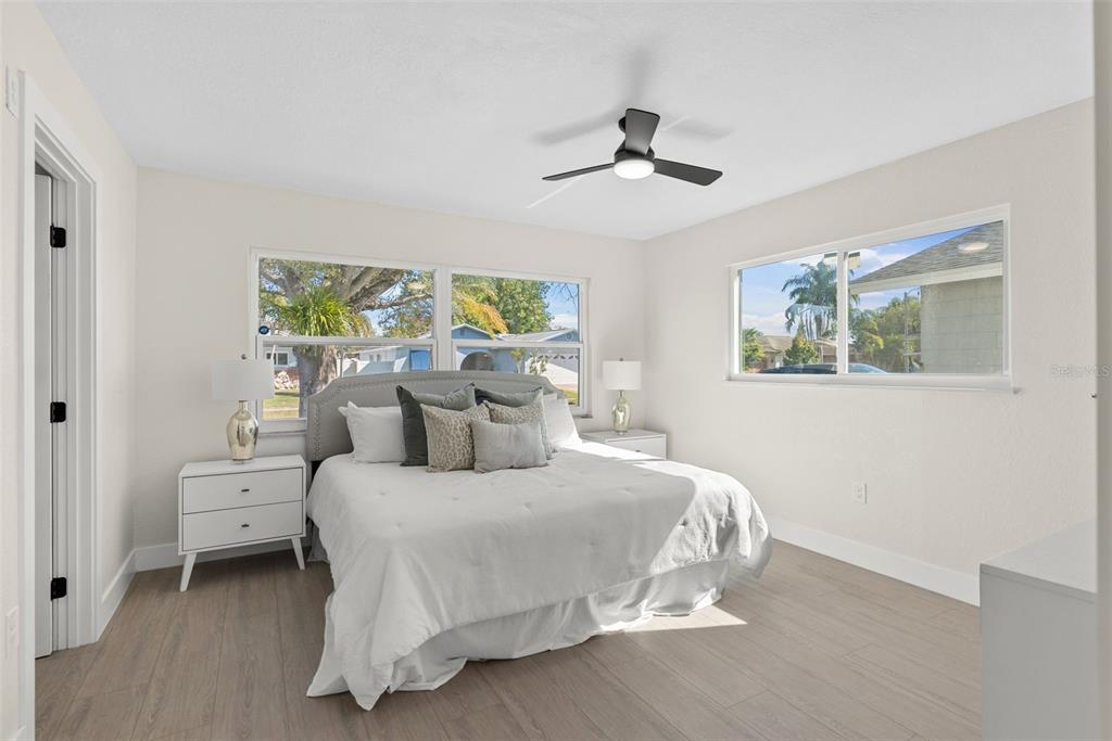 12368 70th Street Largo, FL 33773 - Photo 21 of 33 a bedroom with a bed and a window