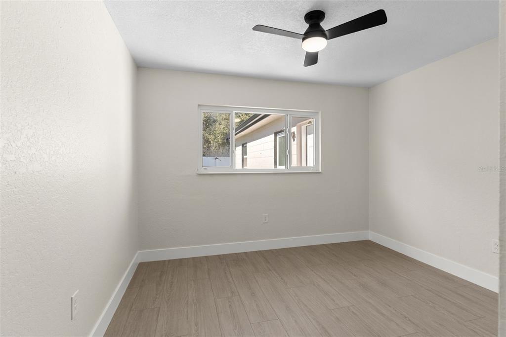 12368 70th Street Largo, FL 33773 - Photo 27 of 33 an empty room with a window