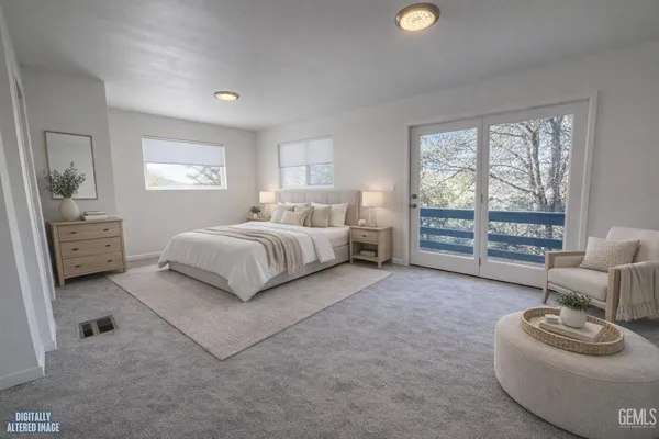 an empty room with windows and entrance