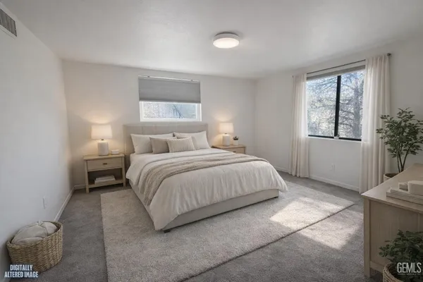 a workspace with furniture and a window