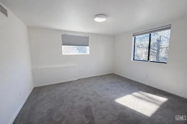 a view of a window in an empty room