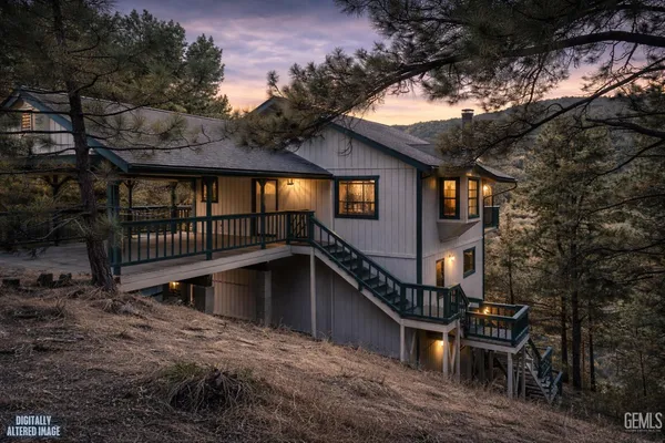a view of a house with a roof deck