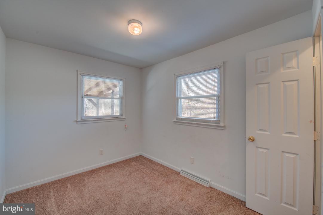 10605 Willetts Crossing Road White Plains, MD 20695 - Photo 11 of 22 an empty room with windows