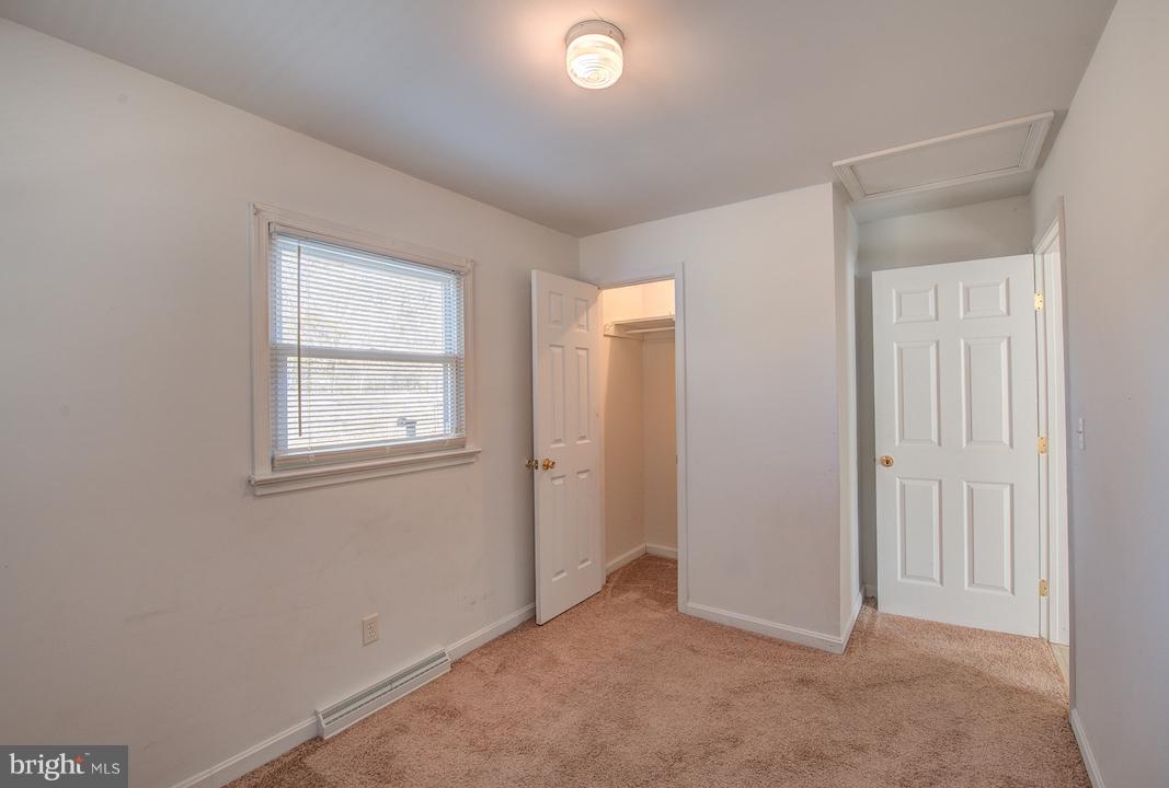 10605 Willetts Crossing Road White Plains, MD 20695 - Photo 13 of 22 an empty room with windows