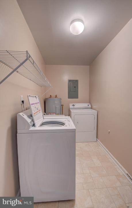 10605 Willetts Crossing Road White Plains, MD 20695 - Photo 15 of 22 a utility room with dryer and washer