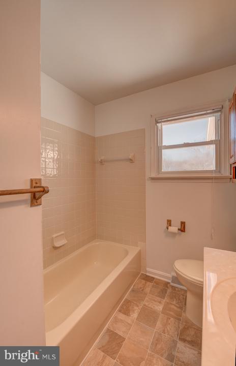 10605 Willetts Crossing Road White Plains, MD 20695 - Photo 17 of 22 a bathroom with a bathtub and a shower