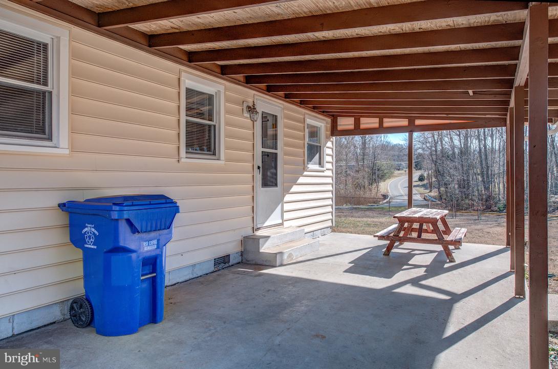 10605 Willetts Crossing Road White Plains, MD 20695 - Photo 20 of 22 a car parked in front of a house