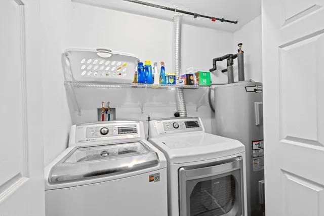 a utility room with dryer and washer