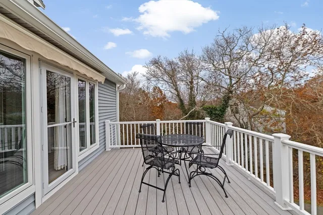 a view of a wooden deck with a patio
