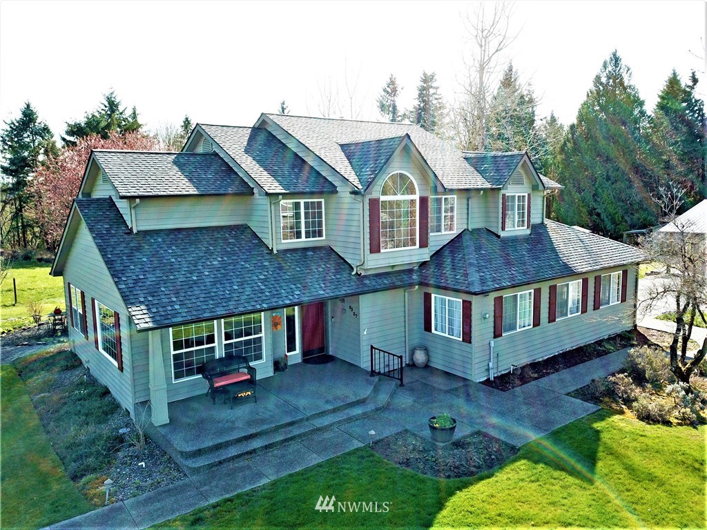 9527 Gastaeson Lane Southwest Rochester, WA 98579 - Photo 1 of 40 a front view of a house with a yard