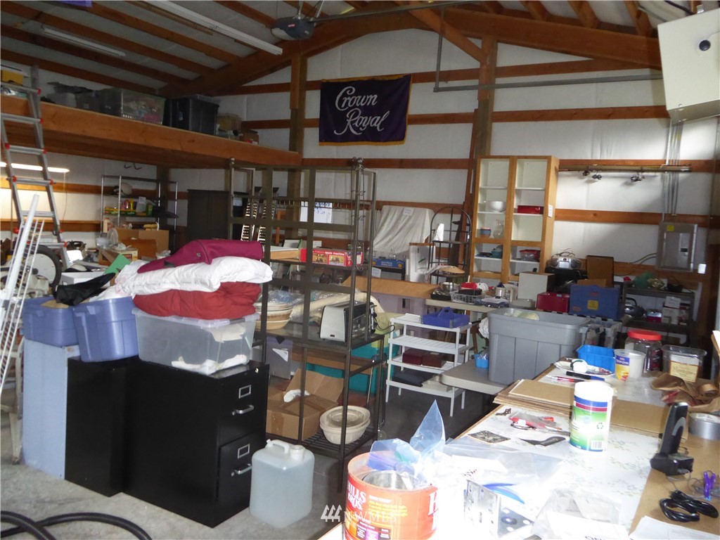 9527 Gastaeson Lane Southwest Rochester, WA 98579 - Photo 39 of 40 a store room with lots of different colored cloths