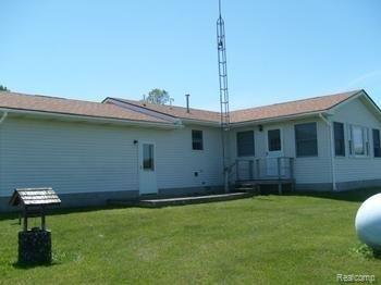 4050 Yax Road Kinde, MI 48445 - Photo 12 of 13 Back of the hojme showing small