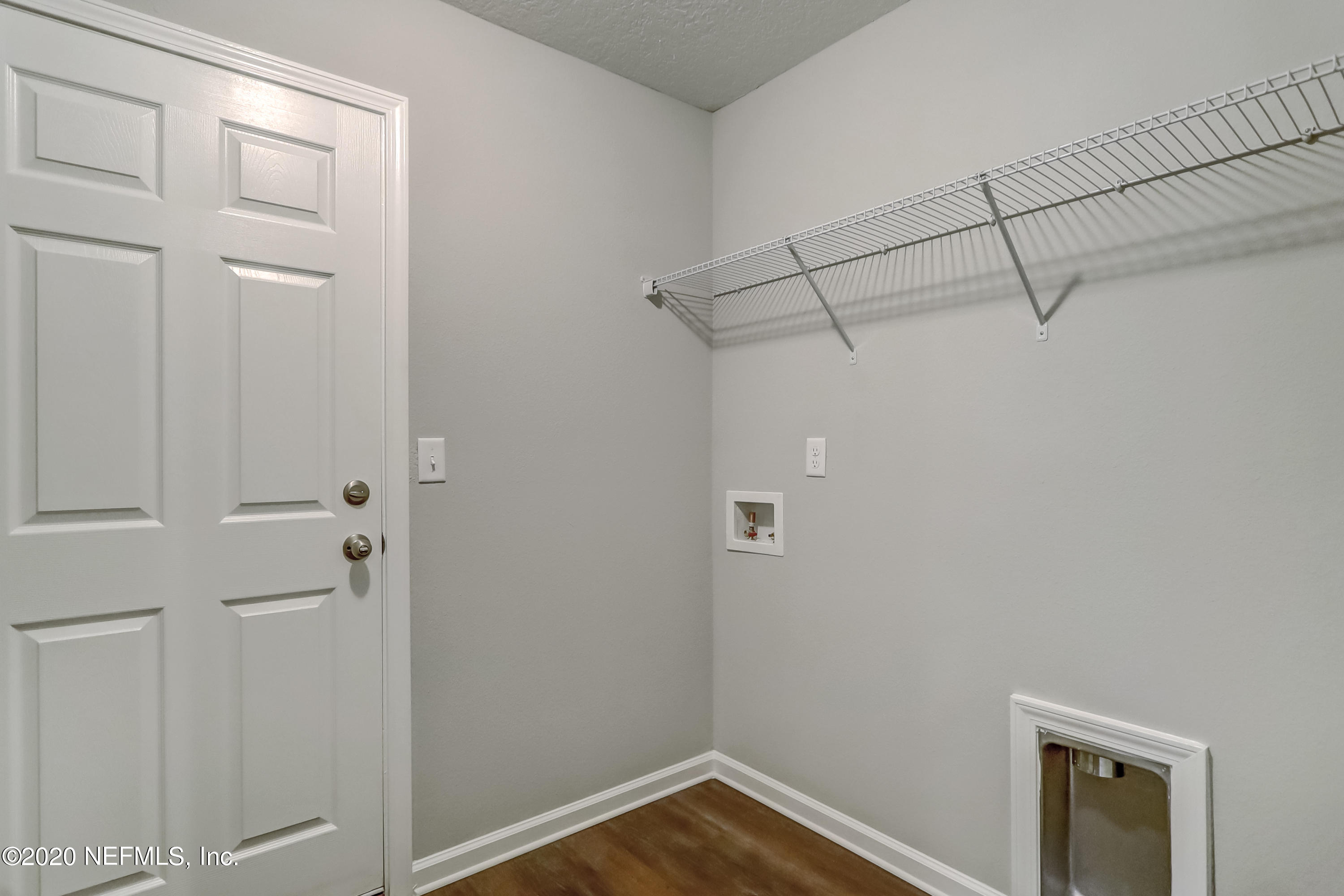 5422 Kennerly Road Jacksonville, FL 32207 - Photo 12 of 41 a view of a room with racks on the wall