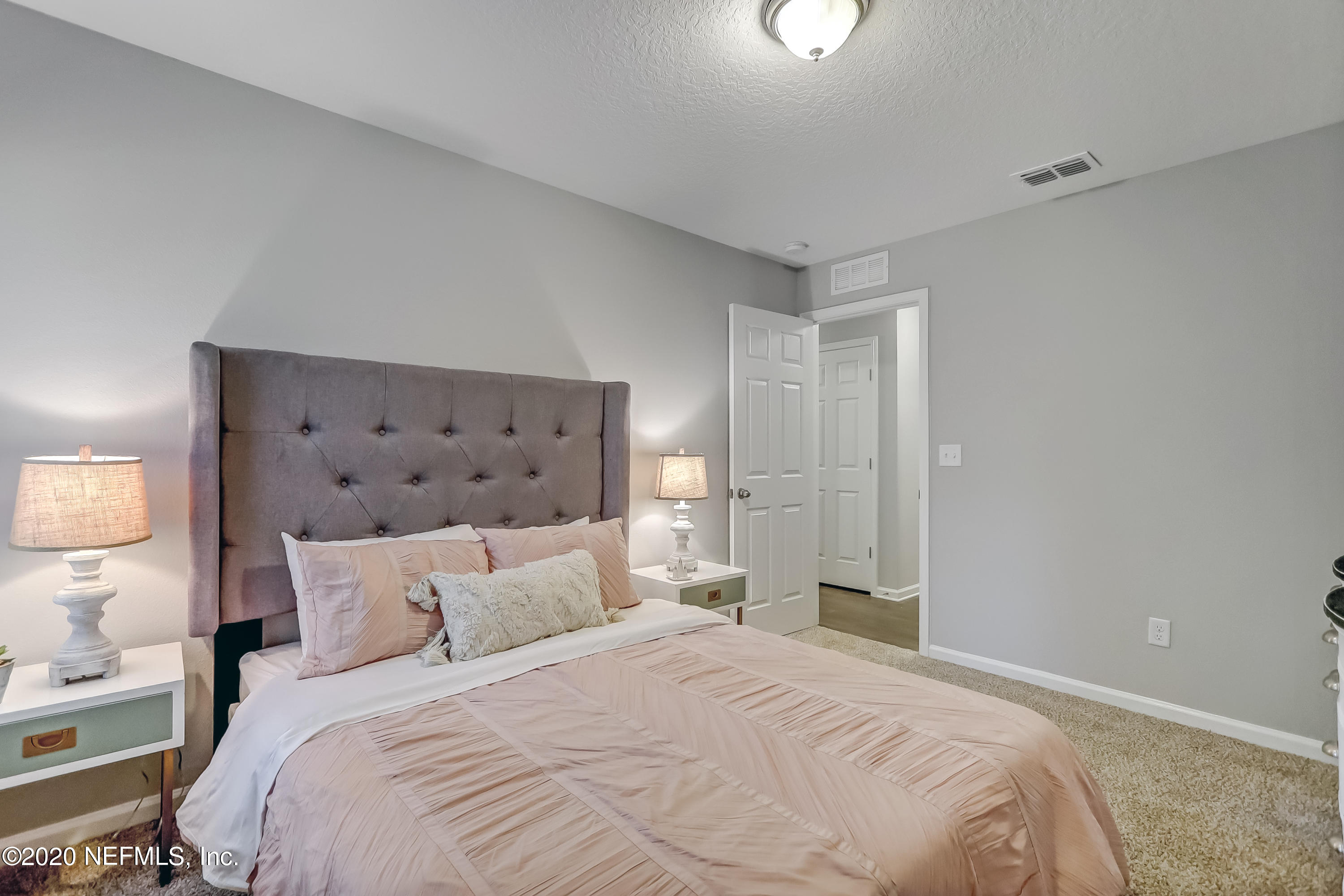 5422 Kennerly Road Jacksonville, FL 32207 - Photo 14 of 41 a bedroom with a bed and a window