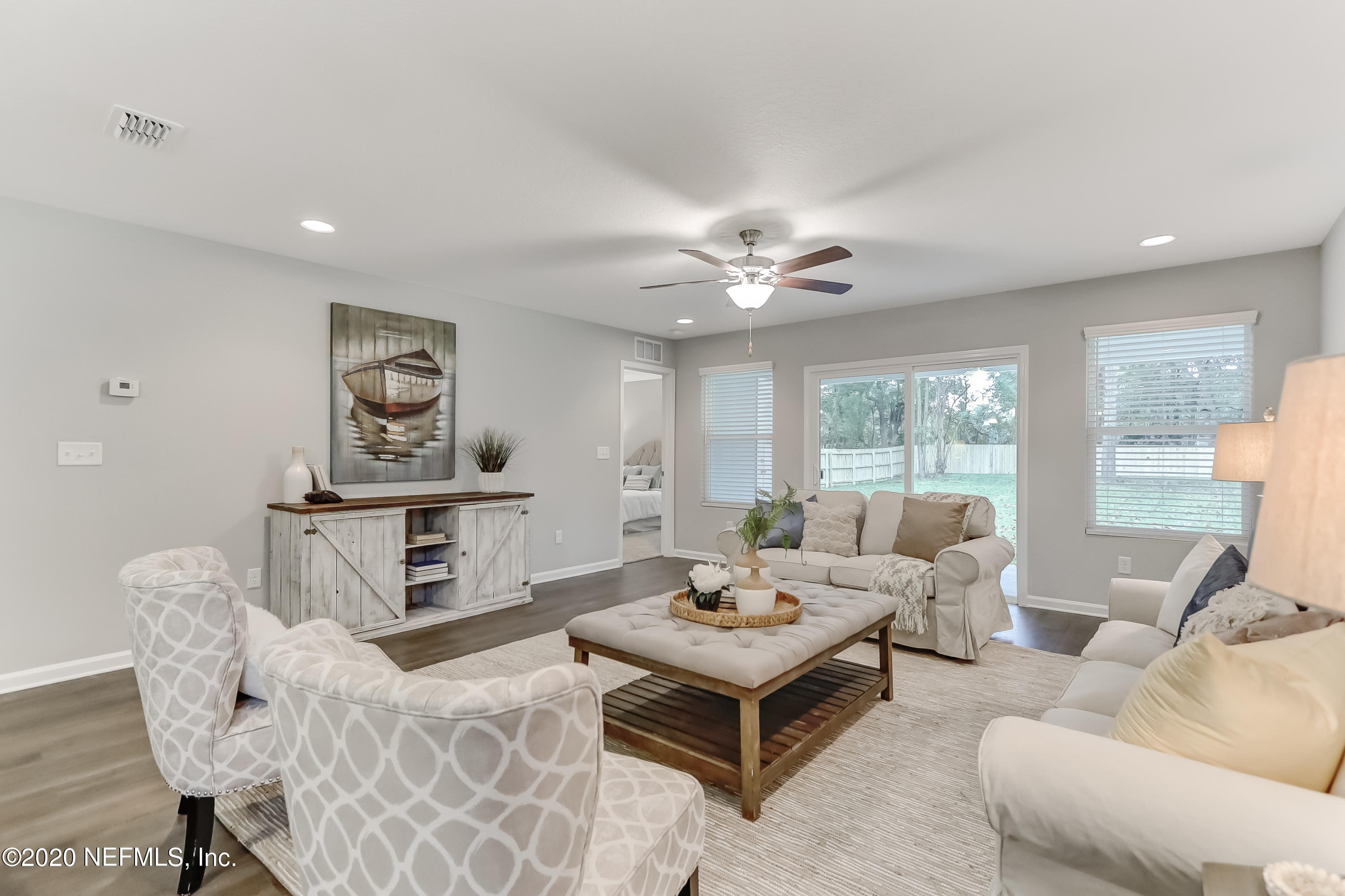 5422 Kennerly Road Jacksonville, FL 32207 - Photo 26 of 41 a living room with furniture and a large window