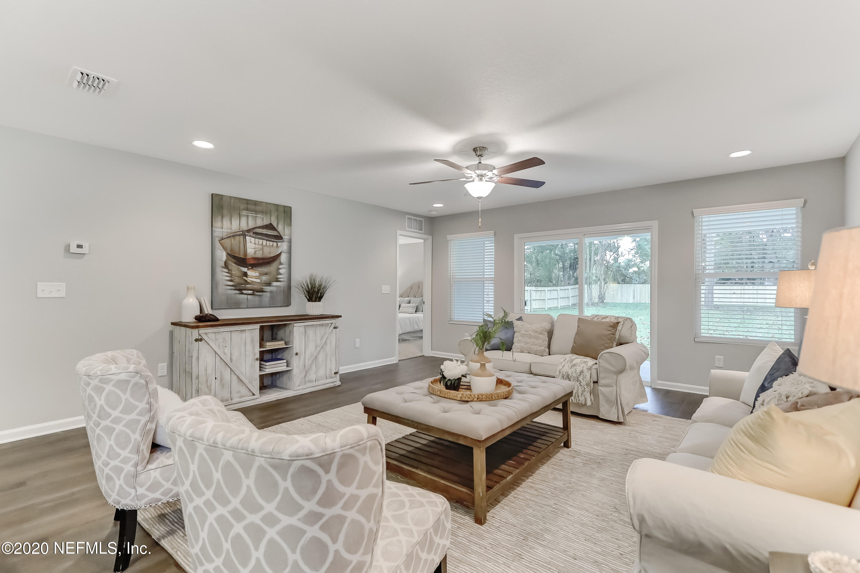 5422 Kennerly Road Jacksonville, FL 32207 - Photo 27 of 41 a living room with furniture and a large window