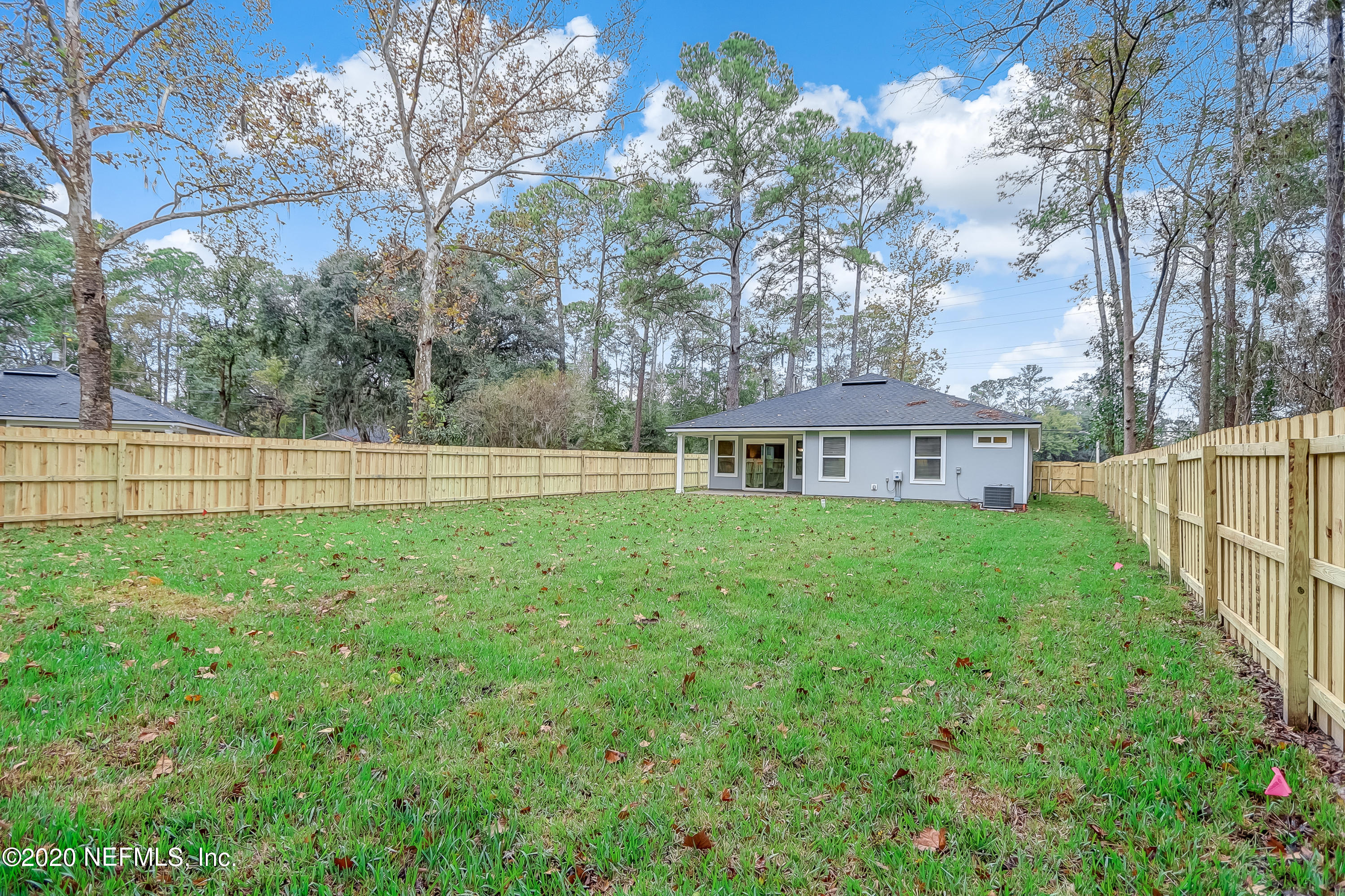 5422 Kennerly Road Jacksonville, FL 32207 - Photo 36 of 41 a view of a house with backyard and garden