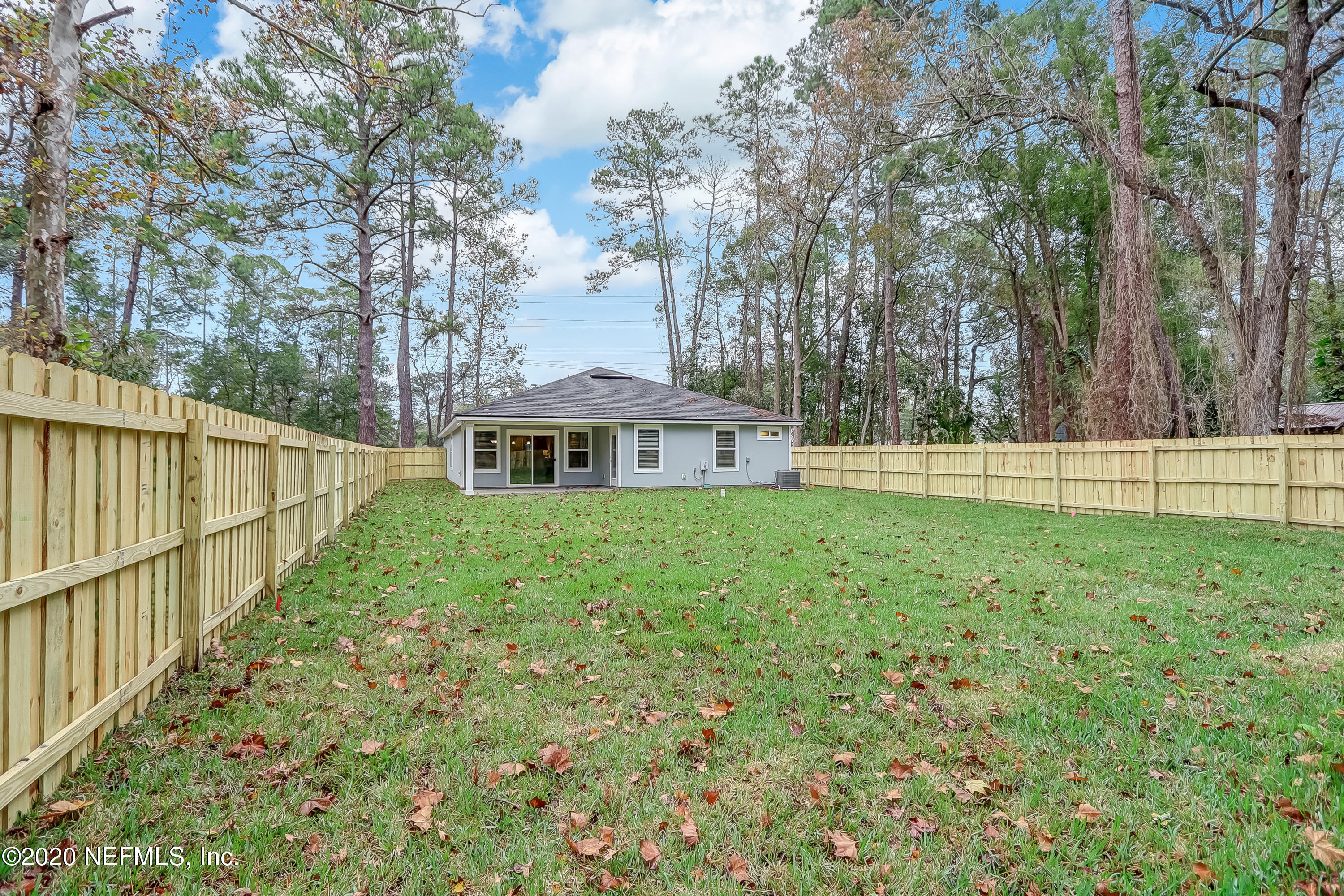 5422 Kennerly Road Jacksonville, FL 32207 - Photo 38 of 41 a front view of a house with a yard