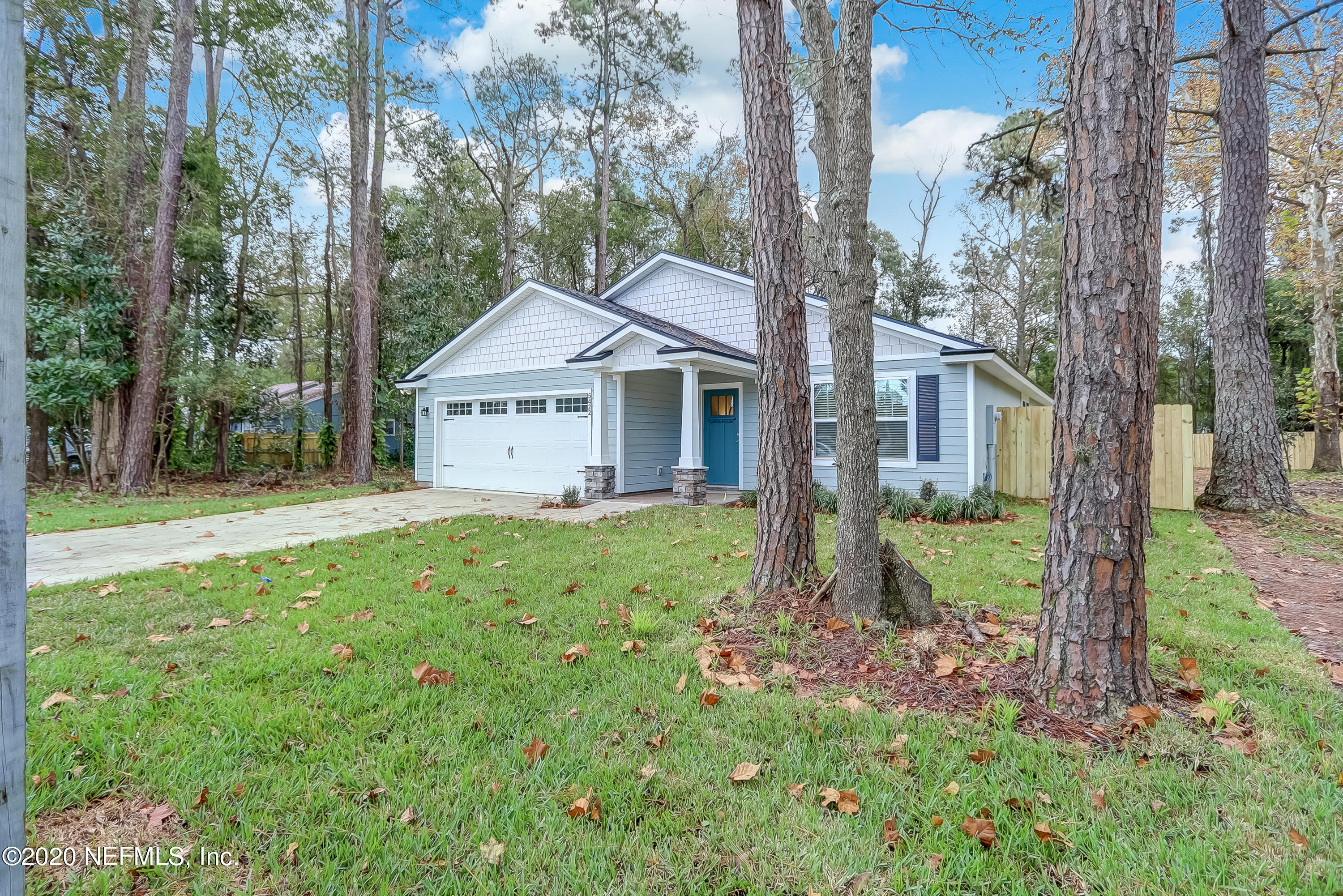 5422 Kennerly Road Jacksonville, FL 32207 - Photo 40 of 41 a view of a house with a yard and large trees