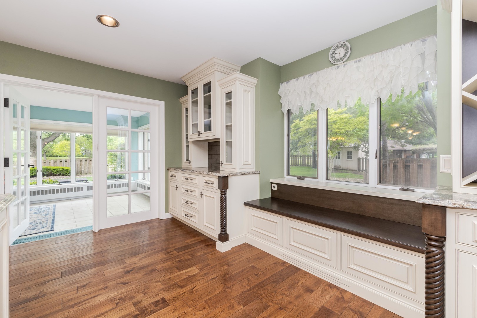 1810 Cardinal Court Pontiac, IL 61764 - Photo 20 of 88 a large white kitchen with granite countertop a large window and a white counter top