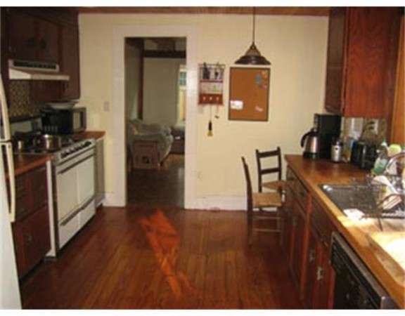 15 Hillside Road Gloucester, MA 01930 - Photo 7 of 10 a kitchen with sink and cabinets