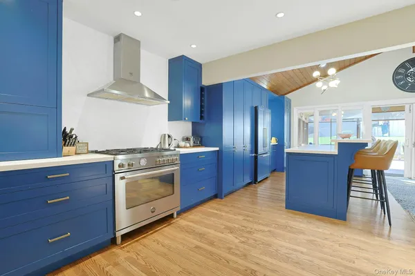 a view of a kitchen dining table and chairs