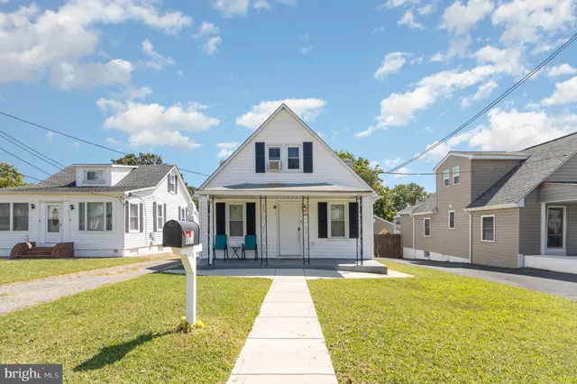 a front view of a house with swimming pool