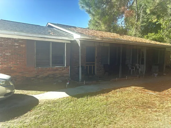 a view of a backyard of the house