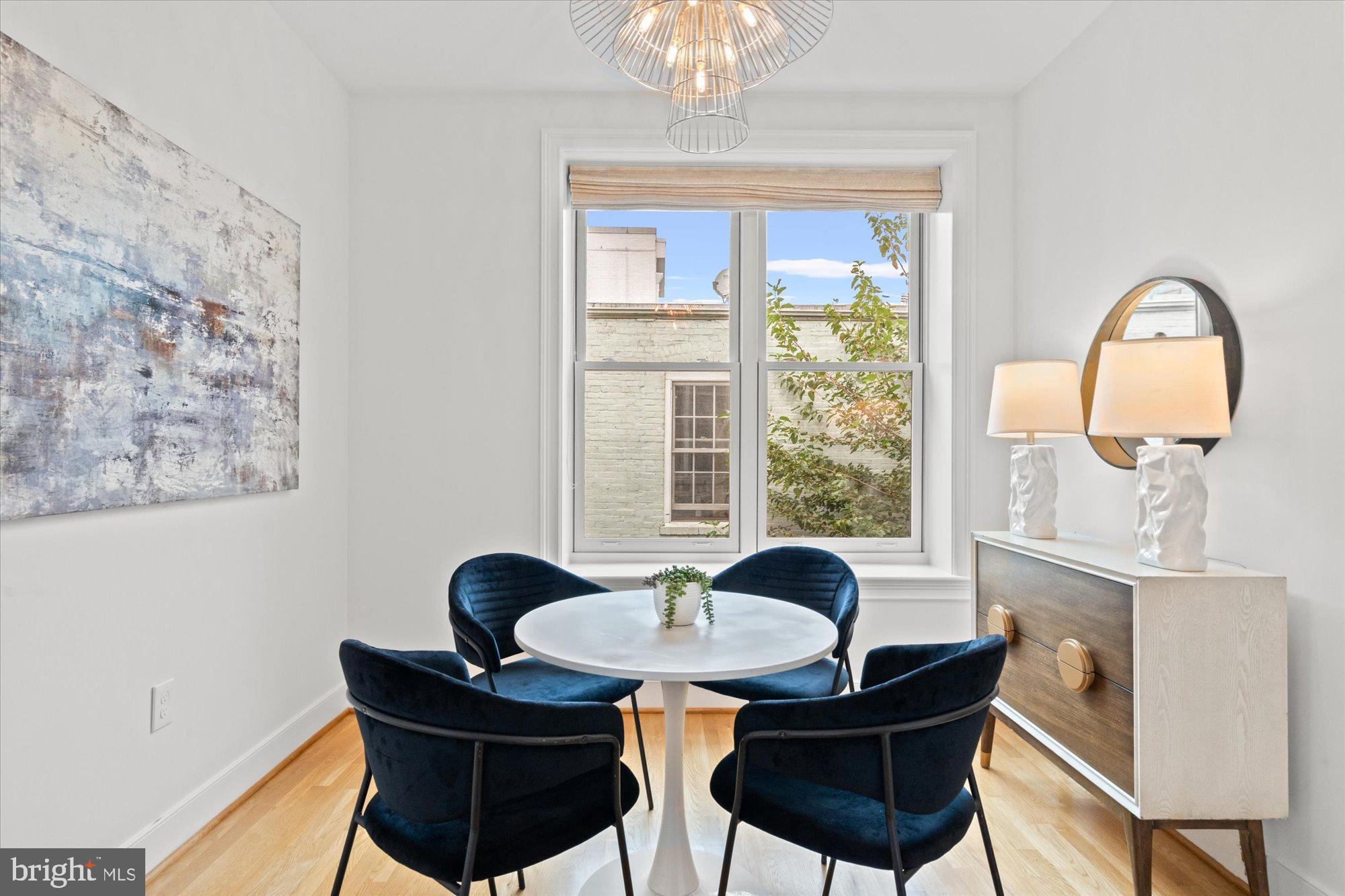 2145 N Street Northwest, Unit 3 Washington, DC 20037 - Photo 12 of 36 a dining room with furniture and window