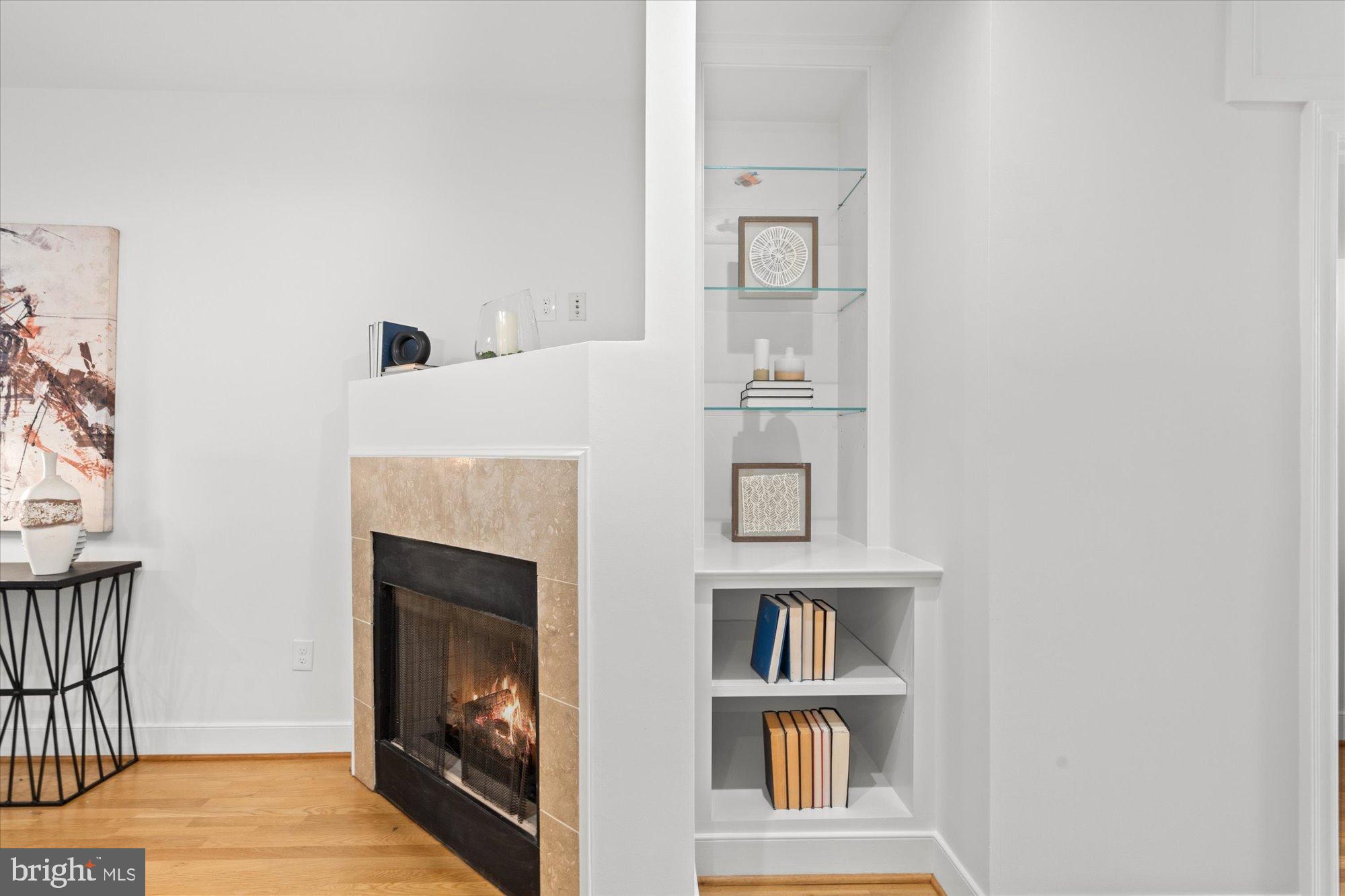 2145 N Street Northwest, Unit 3 Washington, DC 20037 - Photo 9 of 36 a living room with furniture and a fireplace