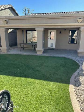 a view of a yard with flowers