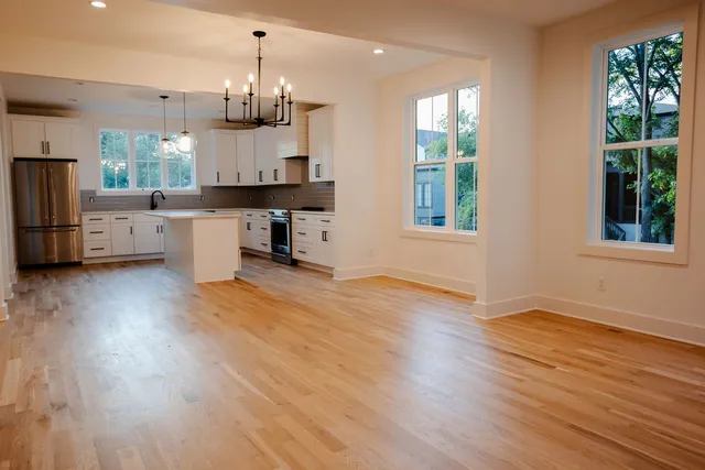 a view of a kitchen with furniture and window