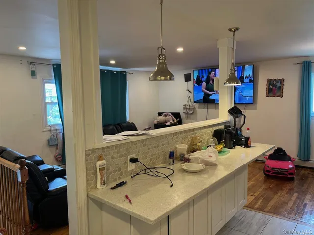 a bathroom with a sink and mirror