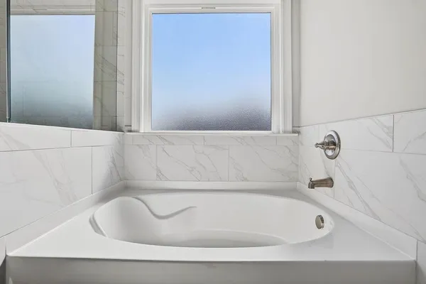 a bathroom with a bathtub