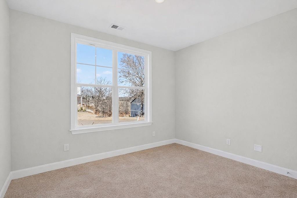 152 Classic Overlook Homer, GA 30547 - Photo 29 of 36 an empty room with a window